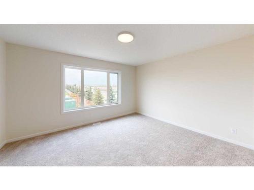 54 Savoy Landing Se, Calgary, AB - Indoor Photo Showing Other Room