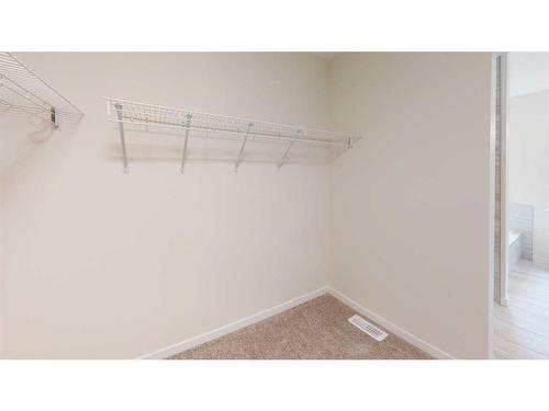 54 Savoy Landing Se, Calgary, AB - Indoor With Storage