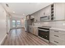 3211-350 Livingston Common Ne, Calgary, AB  - Indoor Photo Showing Kitchen With Upgraded Kitchen 