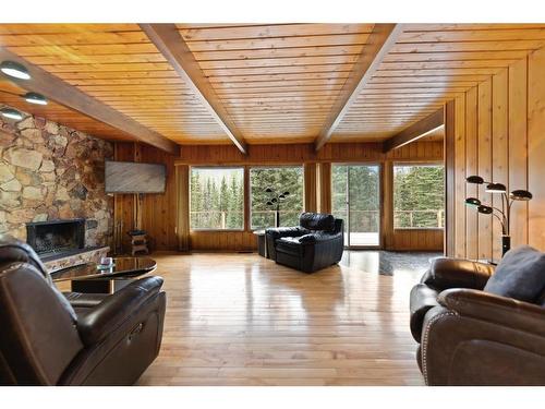 320027 160 Avenue West, Rural Foothills County, AB - Indoor Photo Showing Living Room With Fireplace