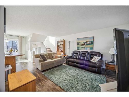 272 Prestwick Heights Se, Calgary, AB - Indoor Photo Showing Living Room