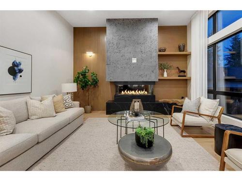 2712 Lougheed Drive Sw, Calgary, AB - Indoor Photo Showing Living Room With Fireplace