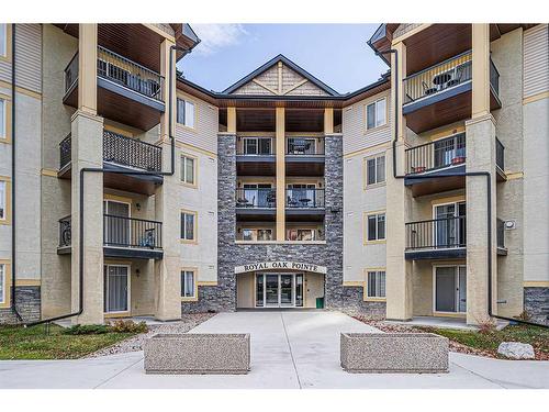 1304-8810 Royal Birch Boulevard Nw, Calgary, AB - Outdoor With Balcony With Facade