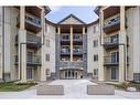 1304-8810 Royal Birch Boulevard Nw, Calgary, AB  - Outdoor With Balcony With Facade 