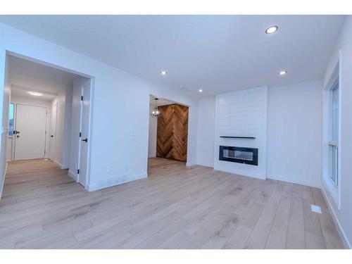 19-11407 Braniff Road Sw, Calgary, AB - Indoor With Fireplace