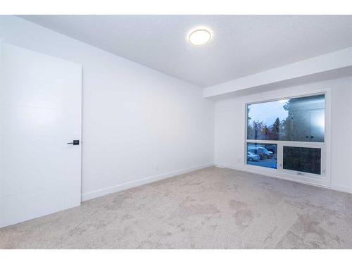 19-11407 Braniff Road Sw, Calgary, AB - Indoor Photo Showing Other Room