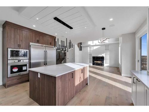 51 South Shore Road, Chestermere, AB - Indoor Photo Showing Kitchen With Fireplace With Stainless Steel Kitchen With Upgraded Kitchen