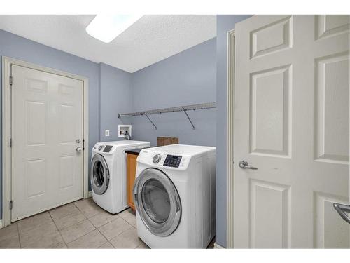 1113 Kincora Drive Nw, Calgary, AB - Indoor Photo Showing Laundry Room