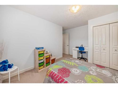 11 Crestridge Way Sw, Calgary, AB - Indoor Photo Showing Bedroom