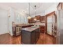 11 Crestridge Way Sw, Calgary, AB  - Indoor Photo Showing Kitchen With Upgraded Kitchen 