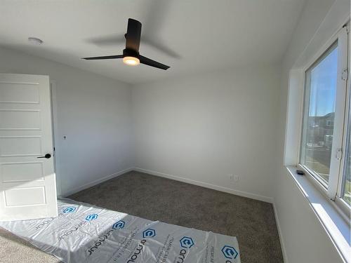 125 Ellen Close, Crossfield, AB - Indoor Photo Showing Other Room