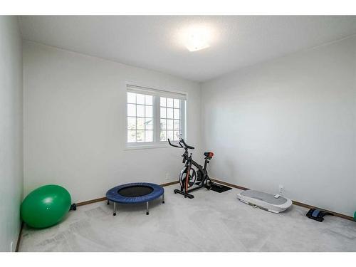 2305 Sirocco Drive Sw, Calgary, AB - Indoor Photo Showing Gym Room