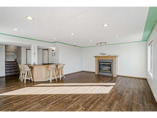 2305 Sirocco Drive Sw, Calgary, AB - Indoor Photo Showing Living Room With Fireplace