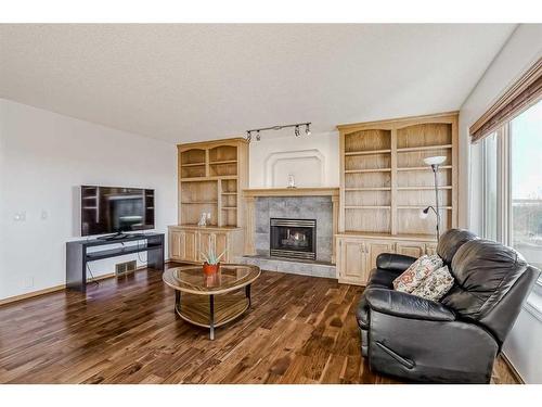 2305 Sirocco Drive Sw, Calgary, AB - Indoor Photo Showing Living Room With Fireplace