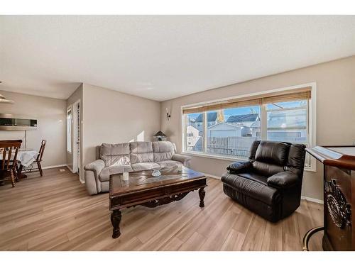 5343 Copperfield Gate Se, Calgary, AB - Indoor Photo Showing Living Room