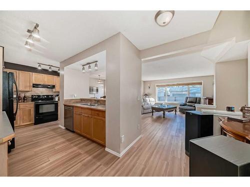 5343 Copperfield Gate Se, Calgary, AB - Indoor Photo Showing Kitchen With Double Sink