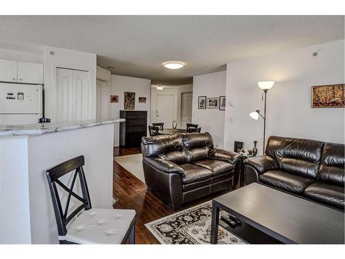 402-2000 Somervale Court Sw, Calgary, AB - Indoor Photo Showing Living Room