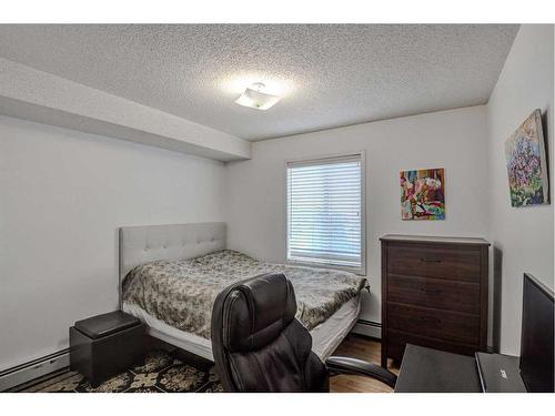 402-2000 Somervale Court Sw, Calgary, AB - Indoor Photo Showing Bedroom