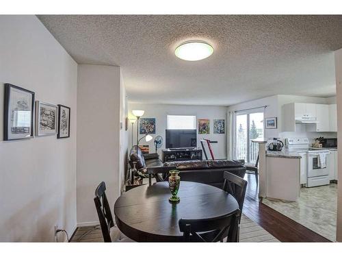 402-2000 Somervale Court Sw, Calgary, AB - Indoor Photo Showing Dining Room