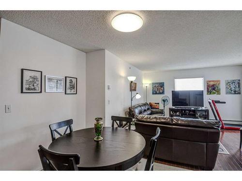 402-2000 Somervale Court Sw, Calgary, AB - Indoor Photo Showing Dining Room