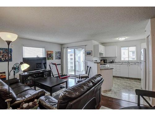 402-2000 Somervale Court Sw, Calgary, AB - Indoor Photo Showing Living Room