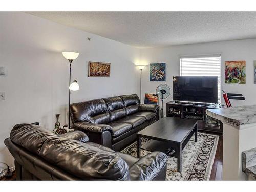 402-2000 Somervale Court Sw, Calgary, AB - Indoor Photo Showing Living Room