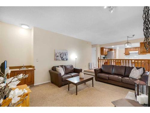 83 Deerbrook Road Se, Calgary, AB - Indoor Photo Showing Living Room