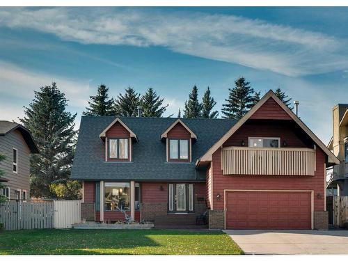 83 Deerbrook Road Se, Calgary, AB - Outdoor With Facade