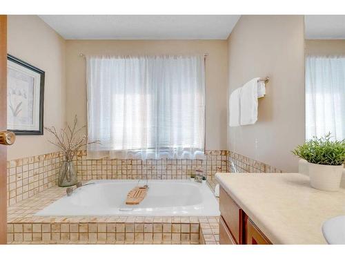 83 Deerbrook Road Se, Calgary, AB - Indoor Photo Showing Bathroom