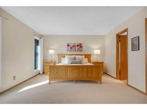 83 Deerbrook Road Se, Calgary, AB - Indoor Photo Showing Bedroom