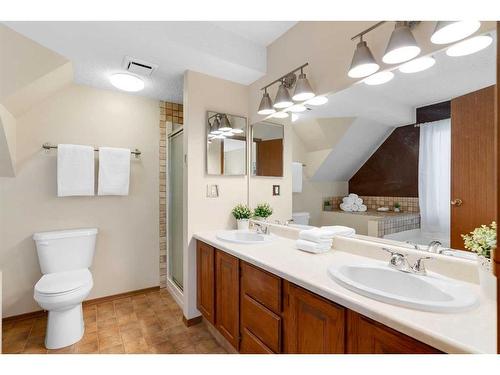 83 Deerbrook Road Se, Calgary, AB - Indoor Photo Showing Bathroom