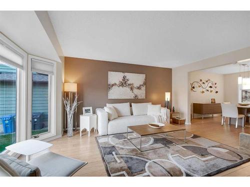 83 Deerbrook Road Se, Calgary, AB - Indoor Photo Showing Living Room