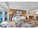 83 Deerbrook Road Se, Calgary, AB  - Indoor Photo Showing Living Room 