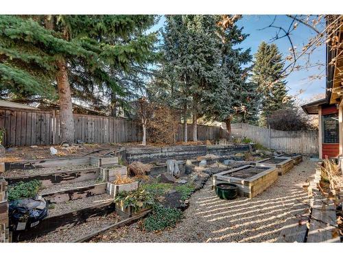 83 Deerbrook Road Se, Calgary, AB - Outdoor With Backyard