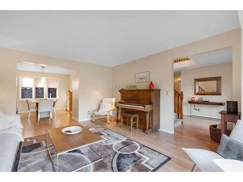 83 Deerbrook Road Se, Calgary, AB - Indoor Photo Showing Living Room