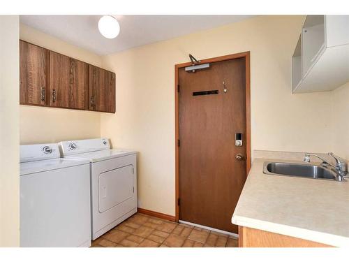 124 Ranch Estates Drive Nw, Calgary, AB - Indoor Photo Showing Laundry Room