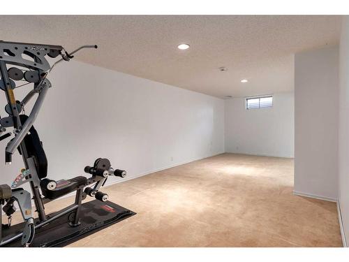 124 Ranch Estates Drive Nw, Calgary, AB - Indoor Photo Showing Gym Room