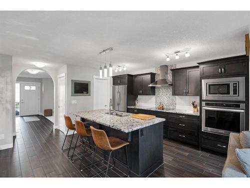 105 Legacy Mews Se, Calgary, AB - Indoor Photo Showing Kitchen With Stainless Steel Kitchen With Upgraded Kitchen