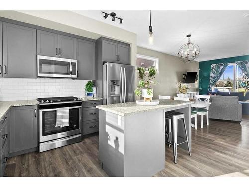 143 Masters Square Se, Calgary, AB - Indoor Photo Showing Kitchen With Stainless Steel Kitchen With Upgraded Kitchen