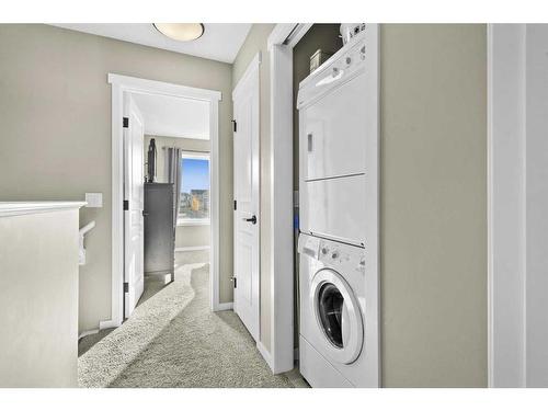 143 Masters Square Se, Calgary, AB - Indoor Photo Showing Laundry Room