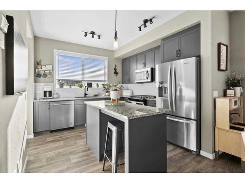 143 Masters Square Se, Calgary, AB - Indoor Photo Showing Kitchen With Stainless Steel Kitchen