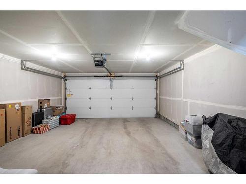 53 Spring Willow Close Sw, Calgary, AB - Indoor Photo Showing Garage