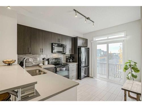 118 Walden Circle Se, Calgary, AB - Indoor Photo Showing Kitchen With Double Sink