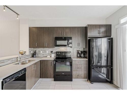 118 Walden Circle Se, Calgary, AB - Indoor Photo Showing Kitchen With Double Sink