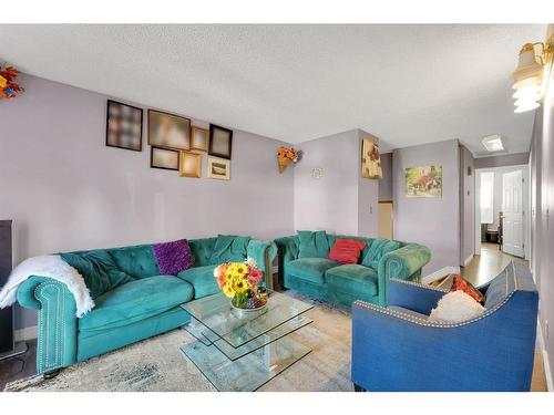 116 Abalone Place Ne, Calgary, AB - Indoor Photo Showing Living Room