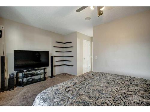 97 Cramond Close Se, Calgary, AB - Indoor Photo Showing Bedroom