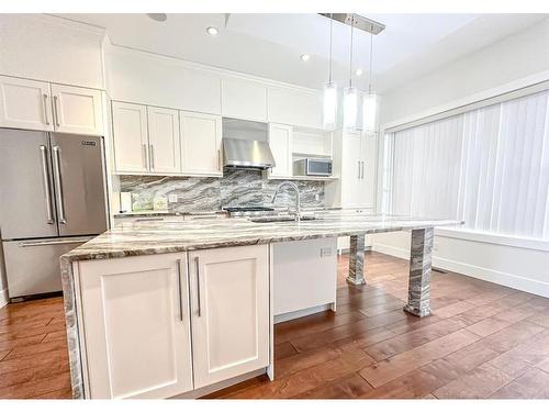 2433 28 Avenue Sw, Calgary, AB - Indoor Photo Showing Kitchen With Upgraded Kitchen