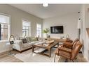 1129 Chinook Gate Bay Sw, Airdrie, AB  - Indoor Photo Showing Living Room 