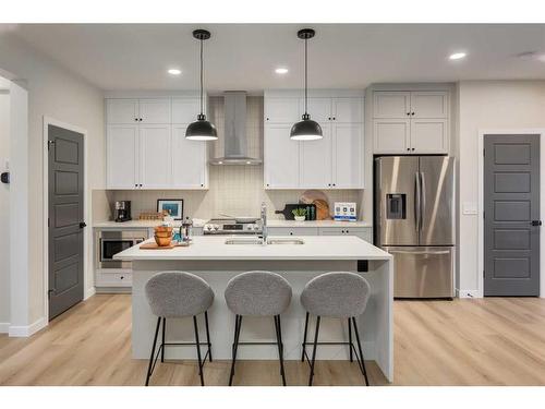 1129 Chinook Gate Bay Sw, Airdrie, AB - Indoor Photo Showing Kitchen With Upgraded Kitchen