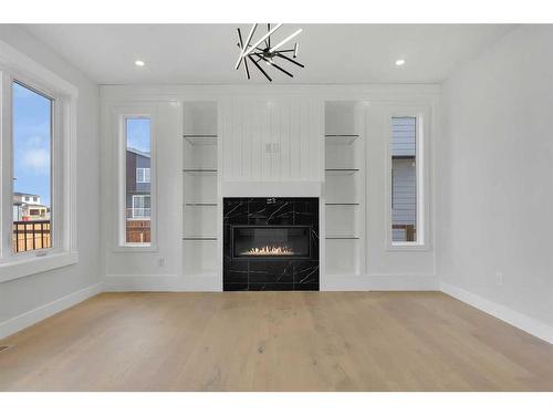 38 South Shore Road, Chestermere, AB - Indoor Photo Showing Other Room With Fireplace